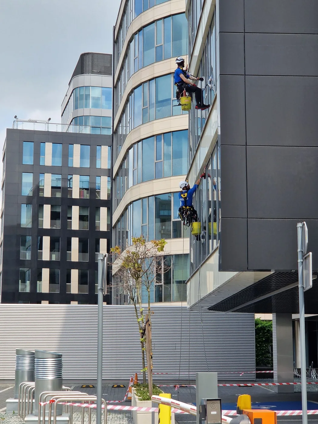 Modern office building with broad glass windows.